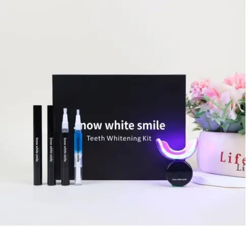 Teeth whitening kit with black box labeled 'how white smile' on a light background.